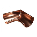 Copper guttering inside box on a white background
